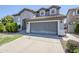 Charming two-story home boasting an attached two-car garage and a well-maintained front yard at 2135 S Bristol --, Mesa, AZ 85209