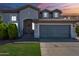 Stunning two-story home showcasing a well-manicured lawn and an attached two-car garage for convenience at 2135 S Bristol --, Mesa, AZ 85209