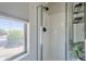 Bright bathroom featuring a glass-door walk-in shower with modern fixtures at 2135 S Bristol --, Mesa, AZ 85209