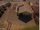 Aerial view of a single story home and its back yard with desert landscaping at 22609 S 214Th Way, Queen Creek, AZ 85142