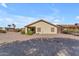 Backyard with low maintenance landscaping and a covered patio, great for relaxing outdoors at 22609 S 214Th Way, Queen Creek, AZ 85142