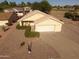 Single story home featuring low maintenance desert landscaping and an attached two car garage at 22609 S 214Th Way, Queen Creek, AZ 85142