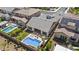 Stunning aerial perspective showcasing a well-manicured backyard featuring a sparkling pool at 23097 N 95Th Dr, Peoria, AZ 85383