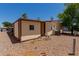 A peaceful backyard with low-maintenance gravel, offering easy outdoor enjoyment at 245 S 56Th St # 135, Mesa, AZ 85206
