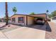Single-story home with a convenient carport, desert landscaping, and a comfortable, inviting exterior at 245 S 56Th St # 135, Mesa, AZ 85206