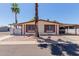 Charming single-story home with mature landscaping and a convenient carport for covered parking at 245 S 56Th St # 135, Mesa, AZ 85206