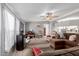 Cozy living room with a ceiling fan, comfortable seating, and a bright, airy feel, perfect for relaxing at 245 S 56Th St # 135, Mesa, AZ 85206