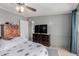 Bedroom featuring a large dresser and a doorway leading to another room at 245 S 56Th St # 135, Mesa, AZ 85206