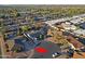 Expansive aerial view of a residential neighborhood showcasing well-spaced homes, lush landscaping, and community streets at 3054 W Redfield Rd, Phoenix, AZ 85053