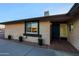 Charming home featuring a well-maintained entrance, terracotta entryway, and manicured landscaping at 3054 W Redfield Rd, Phoenix, AZ 85053