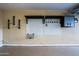 Garage featuring wall organizers for tools, equipment, and accessories at 3054 W Redfield Rd, Phoenix, AZ 85053