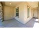 Covered entryway boasts a well-lit path to the front door with stylish stone accents at 3361 E Wisteria Pl, Chandler, AZ 85286