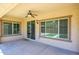 Covered patio featuring a ceiling fan and natural light through large windows at 3361 E Wisteria Pl, Chandler, AZ 85286