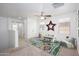 Bright play room with carpet, fun decor, a ceiling fan, and lots of natural light at 3361 E Wisteria Pl, Chandler, AZ 85286