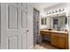 Bathroom featuring a granite countertop vanity and floral shower curtain at 3825 E Camelback Rd # 290, Phoenix, AZ 85018