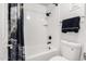 Bathroom features a tub shower with black hardware and a stylish shower curtain at 3825 E Camelback Rd # 290, Phoenix, AZ 85018