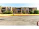 Exterior shot of the building featuring neatly trimmed landscaping and outdoor balcony at 3825 E Camelback Rd # 290, Phoenix, AZ 85018