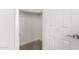 Interior view of closet with hanging rods and shelving at 3825 E Camelback Rd # 290, Phoenix, AZ 85018