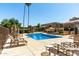 Beautiful community pool area with lounge chairs and shaded pergola for relaxation and recreation at 3825 E Camelback Rd # 290, Phoenix, AZ 85018