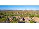 Scenic aerial view of a community with golf course and mountain views at 40619 N Candlewyck Ln, Phoenix, AZ 85086