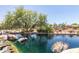 Scenic view of the community playground with slides, climbing structures, and water feature providing recreation and relaxation at 40619 N Candlewyck Ln, Phoenix, AZ 85086