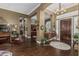 Elegant entryway with hardwood floors, chandelier, and classic architectural details at 40619 N Candlewyck Ln, Phoenix, AZ 85086
