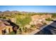 Beautiful single-story home with a three-car garage and desert landscaping with mountain views in a golf course community at 40619 N Candlewyck Ln, Phoenix, AZ 85086