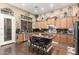 Stylish kitchen featuring granite countertops, modern appliances, and ample cabinet space at 40619 N Candlewyck Ln, Phoenix, AZ 85086