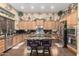 Gourmet kitchen boasting granite countertops, stainless steel appliances, and a center island at 40619 N Candlewyck Ln, Phoenix, AZ 85086