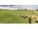 Wide shot of the community soccer field, perfect for games and recreation, set against a mountainous backdrop at 40619 N Candlewyck Ln, Phoenix, AZ 85086