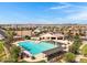 An aerial view of the community pool, shaded picnic areas, and well-maintained landscaping at 4332 E Boston St, Gilbert, AZ 85295