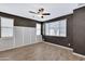 This is a spacious bedroom offering modern fixtures and large windows that provide natural light at 4332 E Boston St, Gilbert, AZ 85295