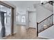 Welcoming foyer featuring tile floors, staircase, and access to the living areas at 4332 E Boston St, Gilbert, AZ 85295