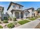 Inviting home exterior featuring low maintenance landscaping and a covered porch with stylish architectural accents at 4332 E Boston St, Gilbert, AZ 85295