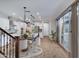 Open-concept kitchen and dining area with stainless steel appliances, island, and sliding glass doors at 4332 E Boston St, Gilbert, AZ 85295