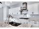 Kitchen featuring granite countertops, stainless steel appliances and island with sink at 4332 E Boston St, Gilbert, AZ 85295