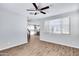 Open-concept living area showcasing tile floors, bright walls, and seamless access to the kitchen at 4332 E Boston St, Gilbert, AZ 85295
