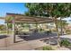 A beautiful picnic area with a shelter and several picnic tables in a well-maintained neighborhood at 4332 E Boston St, Gilbert, AZ 85295
