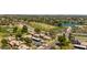 Beautiful aerial view showing the proximity of townhomes to a golf course, lake, clubhouse, and neighborhood amenities at 4502 W Continental Dr, Glendale, AZ 85308