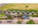 Aerial view of the outdoor recreation facility featuring covered pods and putting greens, perfect for leisure and recreation at 4502 W Continental Dr, Glendale, AZ 85308