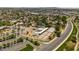 Panoramic overhead shot of community sports complex showcasing tennis courts, swimming pools, and playgrounds at 4502 W Continental Dr, Glendale, AZ 85308