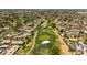 Expansive golf course community featuring lush green fairways, residential homes, and scenic landscapes at 4502 W Continental Dr, Glendale, AZ 85308