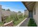 Private backyard featuring landscaped design, including desert plants, with a brick wall at 4502 W Continental Dr, Glendale, AZ 85308