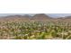 Scenic aerial view overlooking the city, highlighting residential areas with mountain views in the background at 4502 W Continental Dr, Glendale, AZ 85308