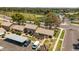 An aerial shows the townhome's well-maintained exterior, landscaping, carport parking, and the surrounding community at 4502 W Continental Dr, Glendale, AZ 85308