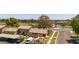 A high-angle shot showcases the well-kept townhome exteriors, lush landscaping, covered parking, and community surroundings at 4502 W Continental Dr, Glendale, AZ 85308