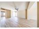 Spacious living room boasts modern flooring, ample natural light and neutral tones at 4516 E Willow Ave, Phoenix, AZ 85032