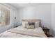 Cozy bedroom with a neutral color palette, including a comfortable bed and side tables at 4711 S Vapor --, Mesa, AZ 85212