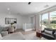 Open-concept living area with views of the adjacent dining area and outdoor balcony at 4711 S Vapor --, Mesa, AZ 85212