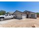 Charming single-story home with a two-car garage and desert landscaping at 4741 N 85Th Ave, Phoenix, AZ 85037